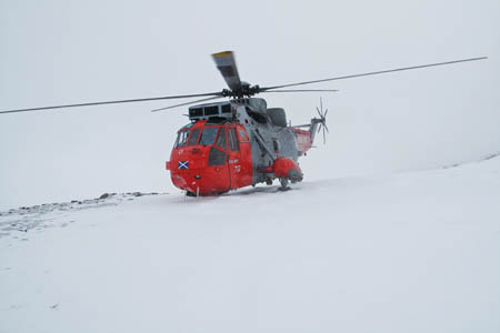 The Royal Navy Sea King landed a short distance from the group. Photo: MoD/Crown Copyright The Royal Navy Sea King landed a short distance from the group. Photo: MoD/Crown Copyright