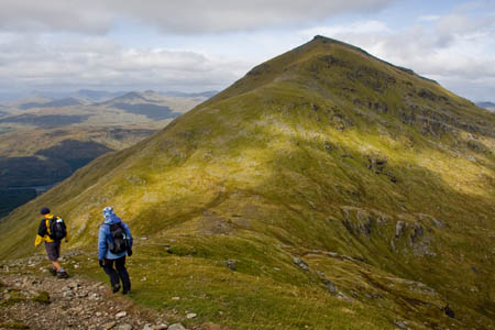 Walkers approach Ben More, one of the southern Highlands' munros
