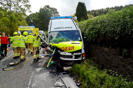 Two team members were slightly injured in the crash in which the old vehicle was written off