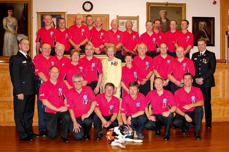 Team members line up at the award ceremony Team members line up at the award ceremony