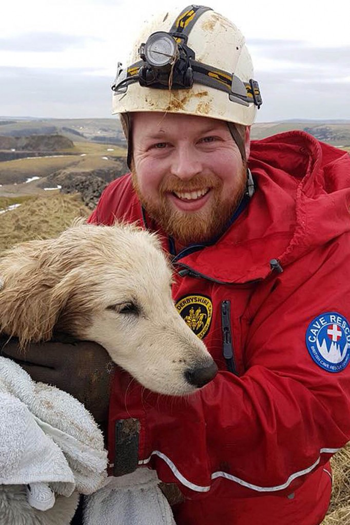 The golden retriever with her rescuer. Photo: Buxton MRT The golden retriever with her rescuer. Photo: Buxton MRT