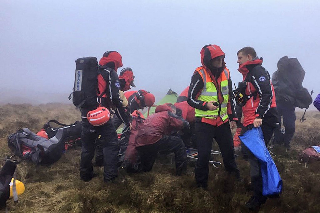 Rescuers at the scene on the Kinder Scout plateau. Photo: Buxton MRT Rescuers at the scene on the Kinder Scout plateau. Photo: Buxton MRT