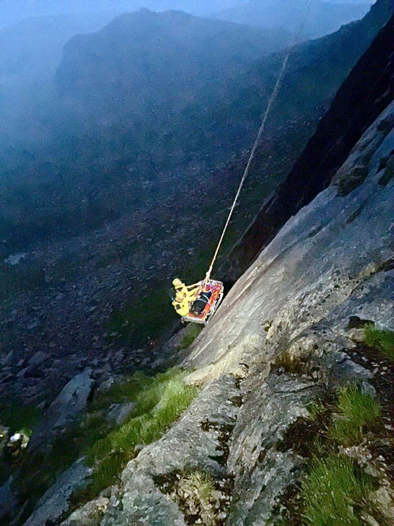 The injured climber is lowered down Shelter Stone Crag. Photo: Cairngorm MRT The injured climber is lowered down Shelter Stone Crag. Photo: Cairngorm MRT