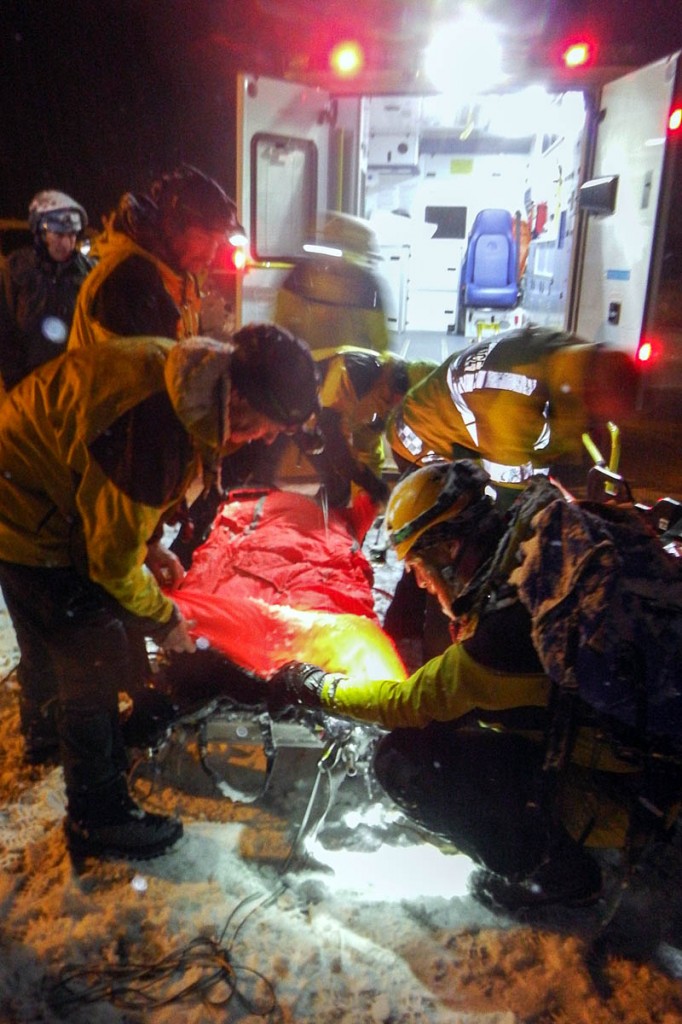 The injured climber was stretchered to a waiting ambulance. Photo: Cairngorm MRT The injured climber was stretchered to a waiting ambulance. Photo: Cairngorm MRT