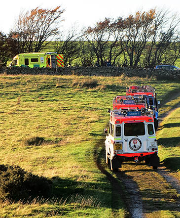 Rescuers brought the woman to a waiting ambulance at Fangs Brow. Photo: Cockermouth MRT Rescuers brought the woman to a waiting ambulance at Fangs Brow. Photo: Cockermouth MRT