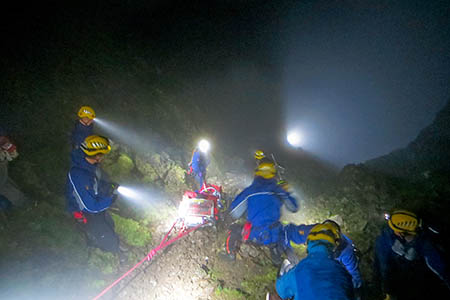 The team lowers the man in darkness. Photo: Cockermouth MRT The team lowers the man in darkness. Photo: Cockermouth MRT