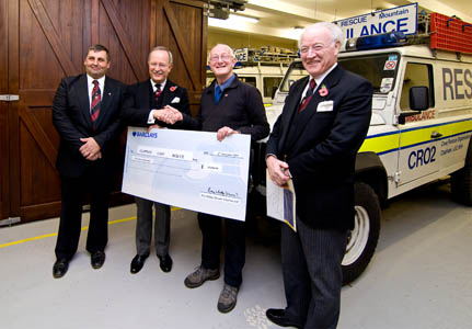 Members of the CRO receive the cheque from the Freemasons