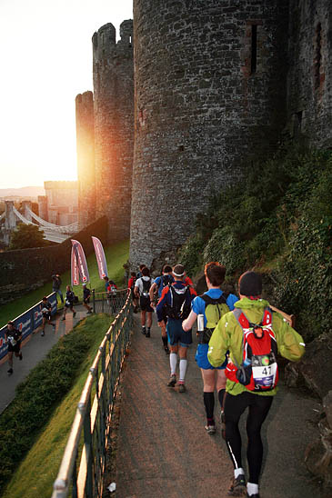 A sunsrise set-off for runners at Conwy Castle. Photo: Rob Howard A sunsrise set-off for runners at Conwy Castle. Photo: Rob Howard