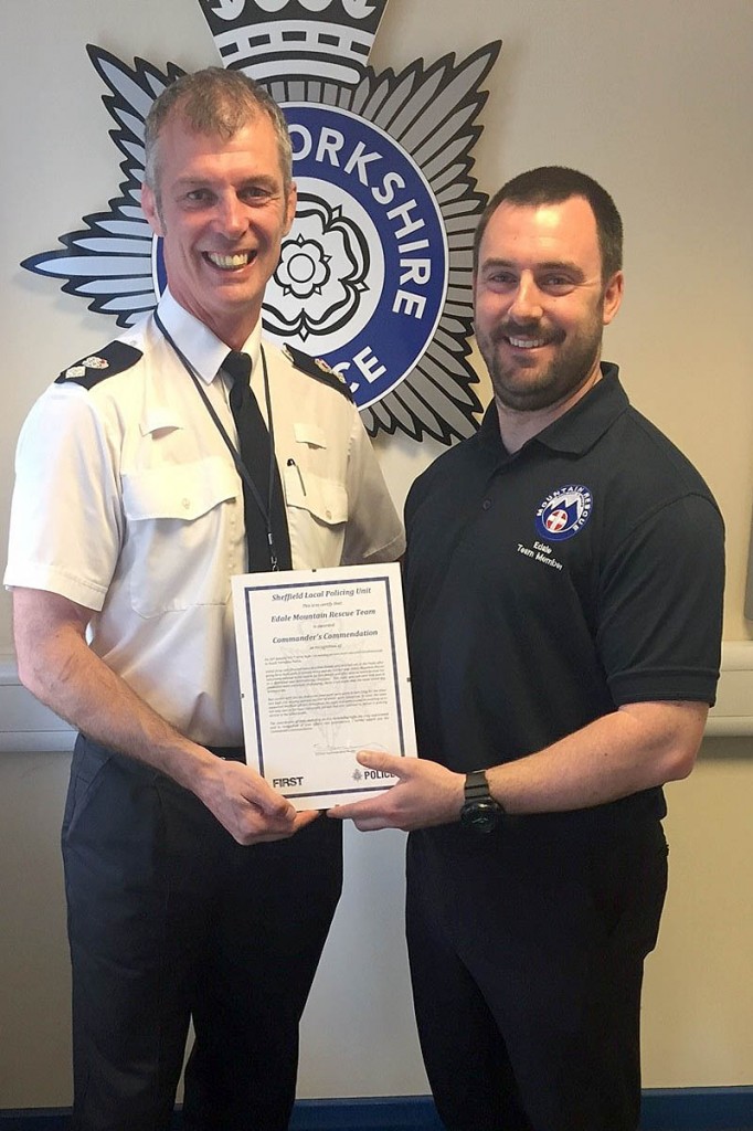Team leader at the time of the incidents, James Stubley, receives the commendation on the team's behalf from Chief Superintendent Shaun Morley