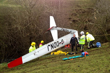 Mountain rescuers join fire and rescue service members at the site of the glider crash. Photo: Edale MRT