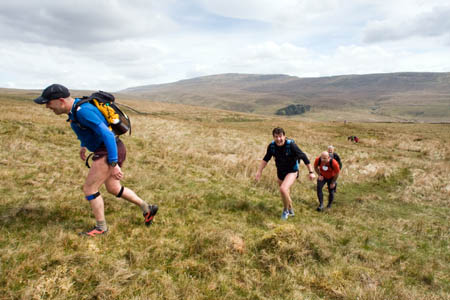 Competitors climb towards Gragareth, with Whernside behind them Competitors climb towards Gragareth, with Whernside behind them