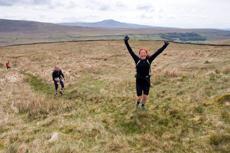 Still full of energy: one Fellsman hiker climbs from Kingsdale, with Ingleborough in the distance Still full of energy: one Fellsman hiker climbs from Kingsdale, with Ingleborough in the distance