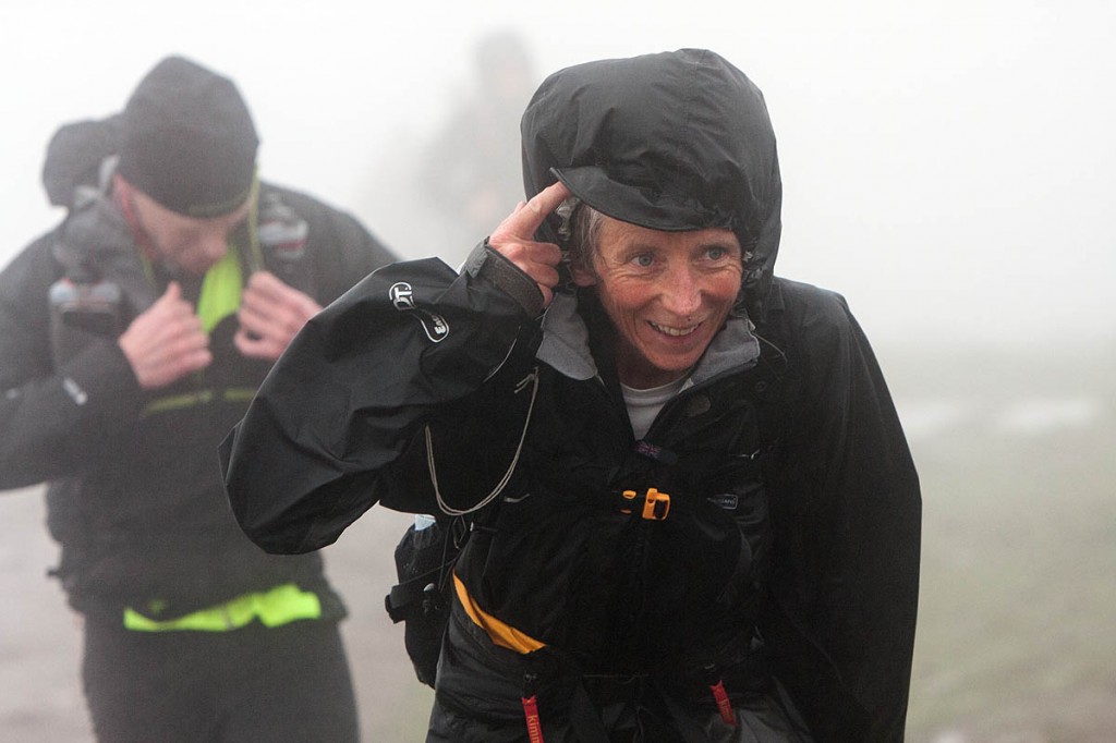 Tough conditions: Fellsman competitors arrive at Whernside summit