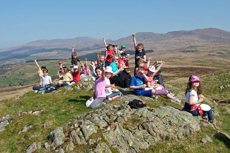 Piece of cake: children from Ysgol Gynradd Brithdir celebrate the new path Piece of cake: children from Ysgol Gynradd Brithdir celebrate the new path