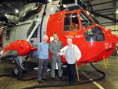 Sandy Brownlie, right, and David Sievewright meet Chief Petty Officer Daz Craig at HMS Gannet