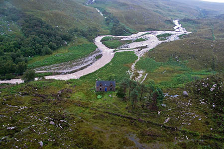 The bothy and the swollen Craig River which blocked the walkers' escape. Photo: Royal Navy The bothy and the swollen Craig River which blocked the walkers' escape. Photo: Royal Navy