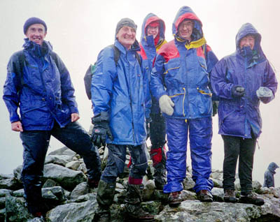 Dr McPartlin completing the munros in record setting group of five, including, Fr Gemmell, centre, the only monsignor to complete the munros