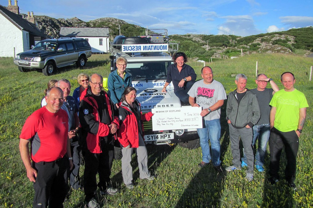Members of Glenrothes Hillwalkers Club hand the cheque to Assynt Mountain Rescue