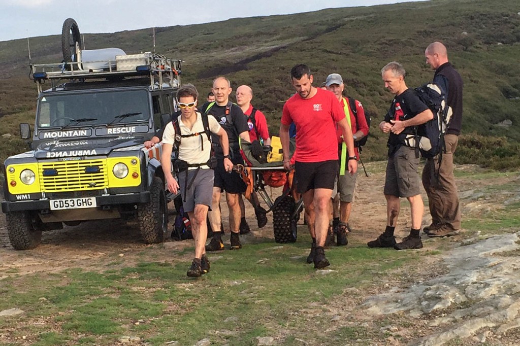 The walker is stretchered from the hill. Photo: Glossop MRT The walker is stretchered from the hill. Photo: Glossop MRT