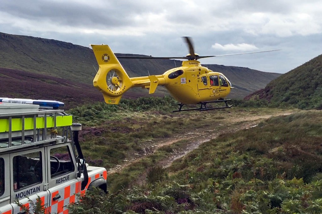 The air ambulance takes off from the hillside. Photo: Glossop MRT