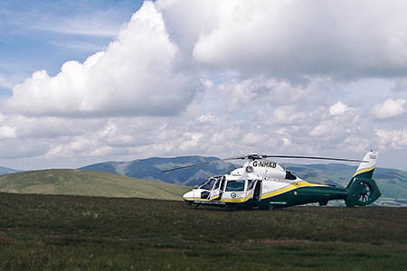 The Great North Air Ambulance is a familiar sight on Lake District fells. Photo: GNAAS