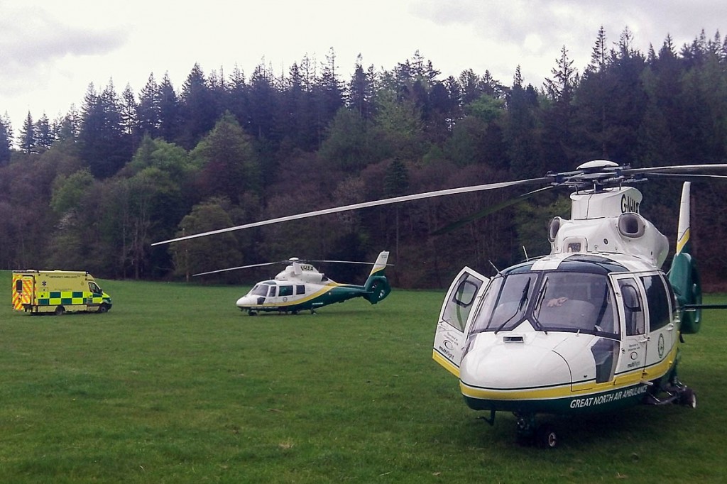 The Great North Air Ambulance's two helicopters at the scene in Grizedale Forest. Photo: GNAAS
