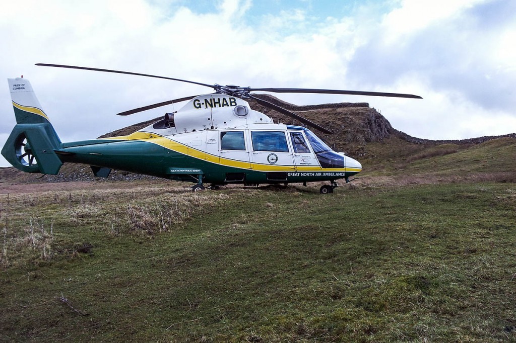 The Great North Air Ambulance's helicopter at the scene on Hadrian's Wall. Photo: GNAAS The Great North Air Ambulance's helicopter at the scene on Hadrian's Wall. Photo: GNAAS