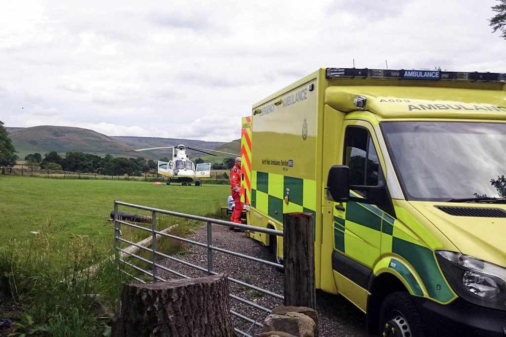 The Great North Air Ambulance and ambulance staff at the scene of the incident. Photo: GNAAS The Great North Air Ambulance and ambulance staff at the scene of the incident. Photo: GNAAS