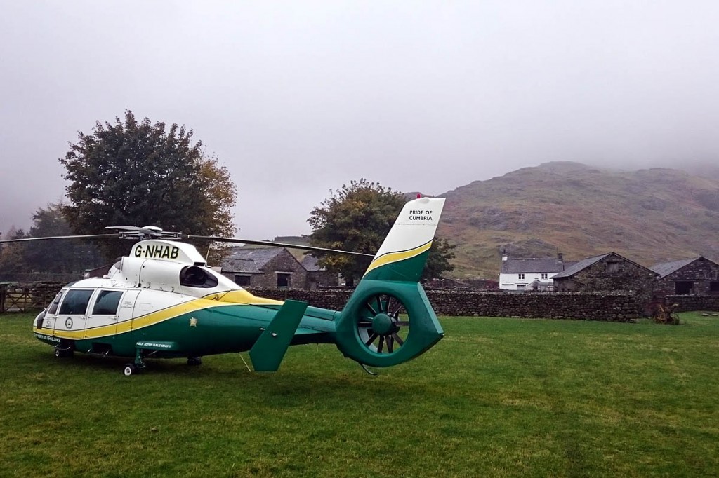The air ambulance at the incident in Great Langdale, with The Band in the background. Photo: GNAAS The air ambulance at the incident in Great Langdale, with The Band in the background. Photo: GNAAS