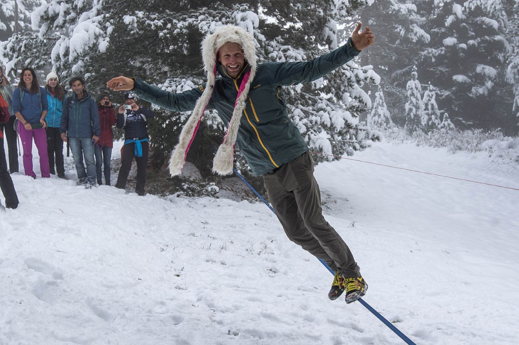 Andrew Lewis, complete with whacky rabbit hood, demonstrates his slackline skills