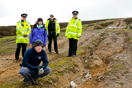 Looking at damage on the Horshoe Pass: Heledd Jones, Countryside Council for Wales, Nick Critchley, Denbighshire Countryside Services,  with, from left, North Wales Police Sergeant Jon Turton, PC James Lang, Community Beat Manager for Llangollen, and Inspector Dewi Roberts