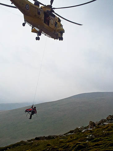 The Sea King in action during the Helvellyn rescue. Photo: Keswick MRT The Sea King in action during the Helvellyn rescue. Photo: Keswick MRT