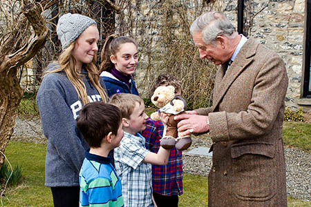 The prince talks to young visitors at Thorns Hall. Photo: Graham Edwards