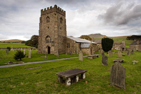 The woman is buried in the graveyard of St Oswald's Church, in the shadow of Pen-y-ghent The woman is buried in the graveyard of St Oswald's Church, in the shadow of Pen-y-ghent