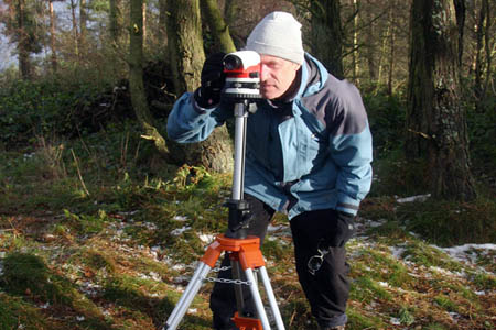 John Barnard surveying on one of the trio's previous ventures