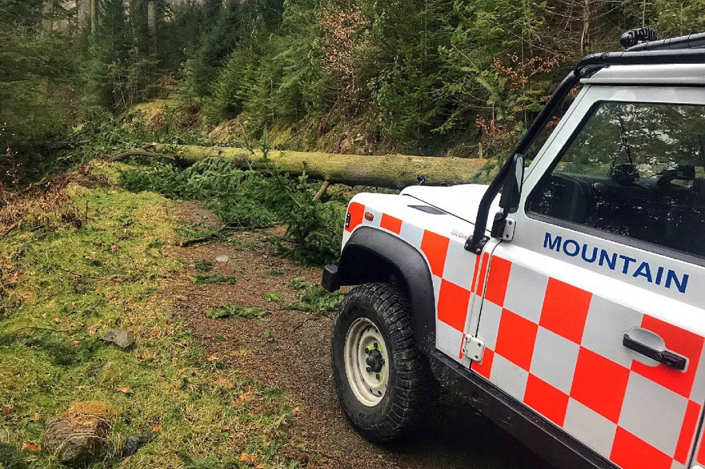 Storm-hit trees blocked the team's Land Rover's progress. Photo: Keswick MRT