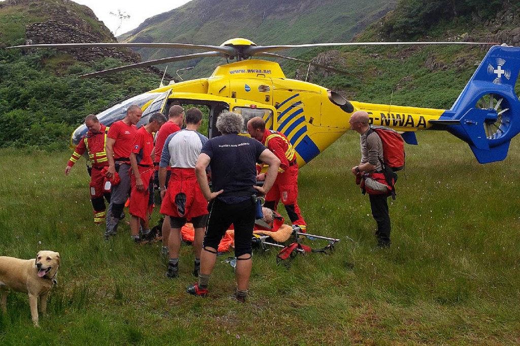 The air ambulance and team members at the Castle Crag incident. Photo: Keswick MRT