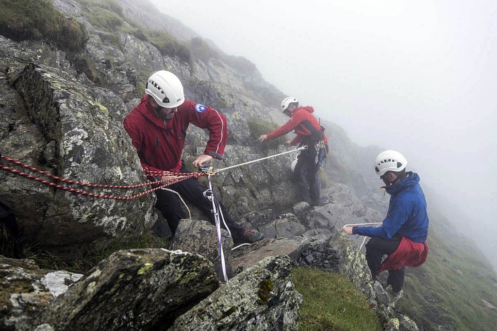Team members rig up a rope sytem during the Foule Crag rescue. Photo: Keswick MRT Team members rig up a rope sytem during the Foule Crag rescue. Photo: Keswick MRT