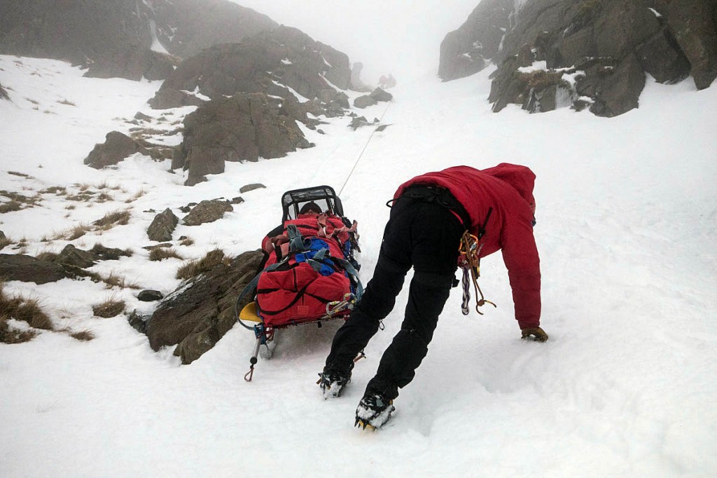 The injured man is lowered down the gully. Photo: Keswick MRT The injured man is lowered down the gully. Photo: Keswick MRT