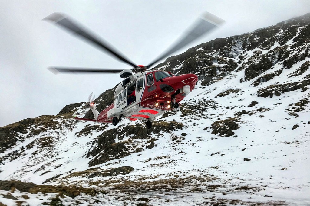 The Coastguard helicopter at the site. Photo: Keswick MRT The Coastguard helicopter at the site. Photo: Keswick MRT