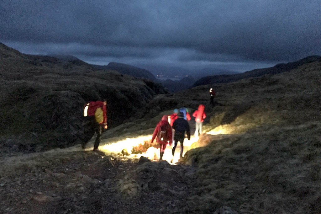 Rescuers led the two walkers to safety from Great End. Photo: Keswick MRT Rescuers led the two walkers to safety from Great End. Photo: Keswick MRT