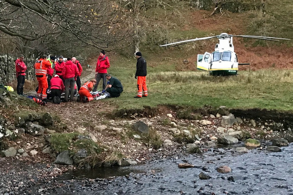 Rescuers and the Great North Air Ambulance at the scene. Photo: Keswick MRT Rescuers and the Great North Air Ambulance at the scene. Photo: Keswick MRT