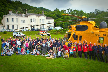 Children from the charities join mountain rescuers and the RAF Sea King crew Children from the charities join mountain rescuers and the RAF Sea King crew