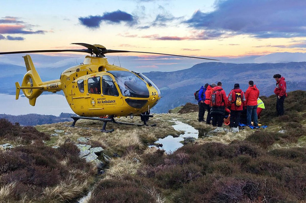 Rescuers and the North West Air Ambulance at the site above Borrowdale. Photo: Keswick MRT Rescuers and the North West Air Ambulance at the site above Borrowdale. Photo: Keswick MRT