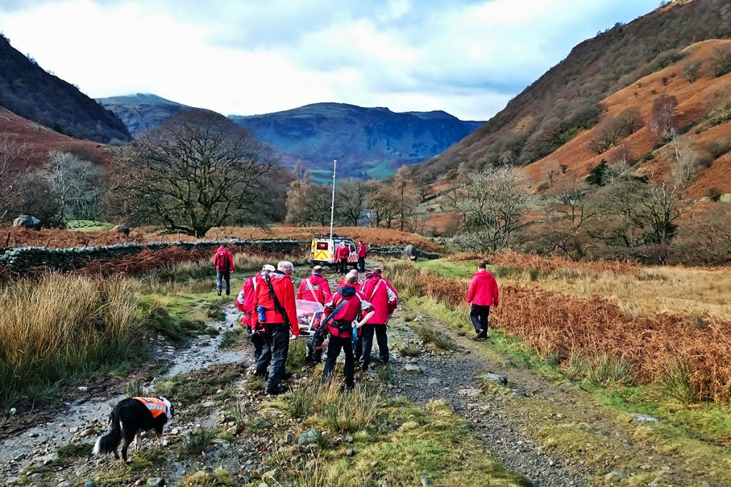 The team arrives at Fairy Glen with the injured walker. Photo: G Lloyd