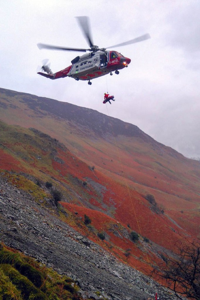 The injured walker is winched from the fell. Photo: Keswick MRT The injured walker is winched from the fell. Photo: Keswick MRT