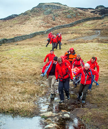 Keswick Mountain Rescue Team in action during the rescue on Puddingstone Bank near Watendlath Keswick Mountain Rescue Team in action during the rescue on Puddingstone Bank near Watendlath