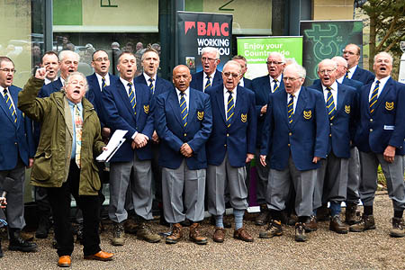 Mike Harding leads the singing of The Manchester Rambler, supported by the Chapel-en-le-Frith Male Voice Choir, complete in walking boots. Photo: Keith Keith Warrender Mike Harding leads the singing of The Manchester Rambler, supported by the Chapel-en-le-Frith Male Voice Choir, complete in walking boots. Photo: Keith Keith Warrender