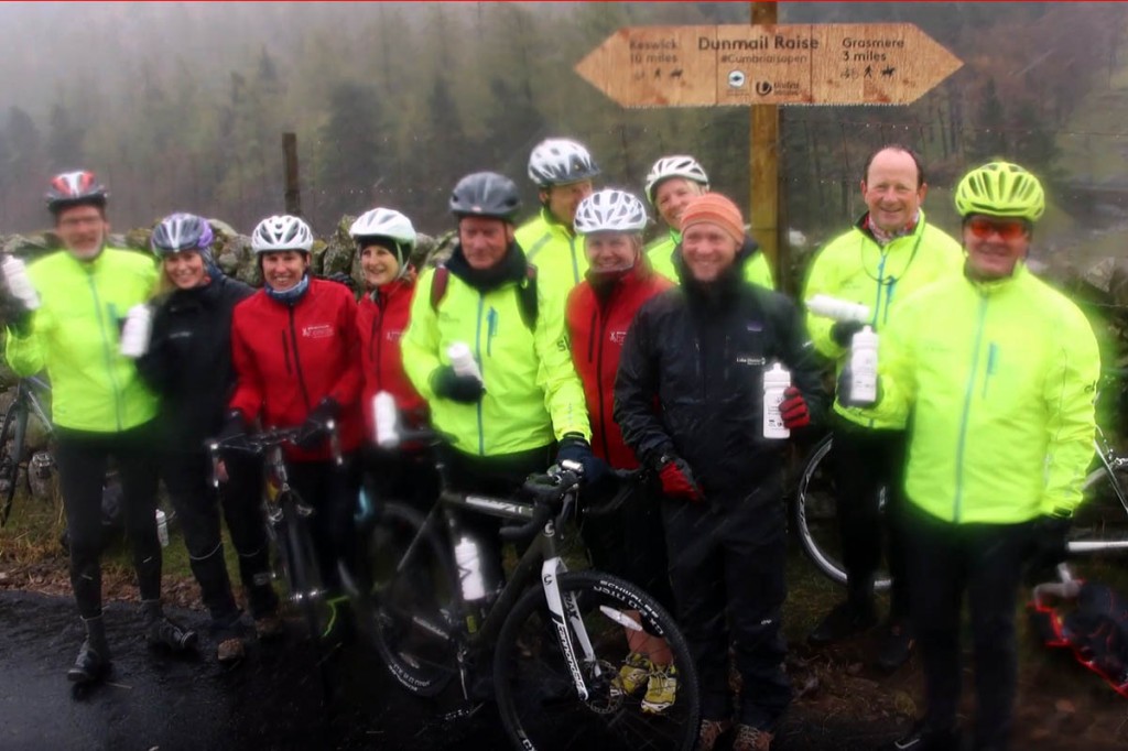 Cyclists gather at the opening on a wet Lake District day. Image: Lake District NPA Cyclists gather at the opening on a wet Lake District day. Image: Lake District NPA