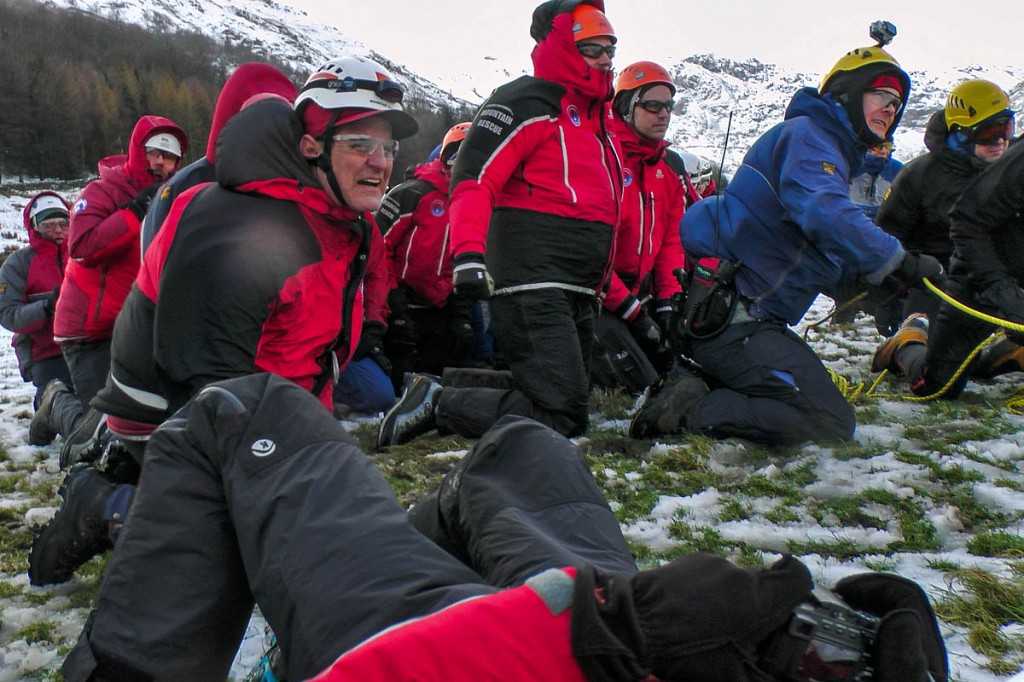 Rescuers feel the force of the downwash as they practise the high-line operation Rescuers feel the force of the downwash as they practise the high-line operation